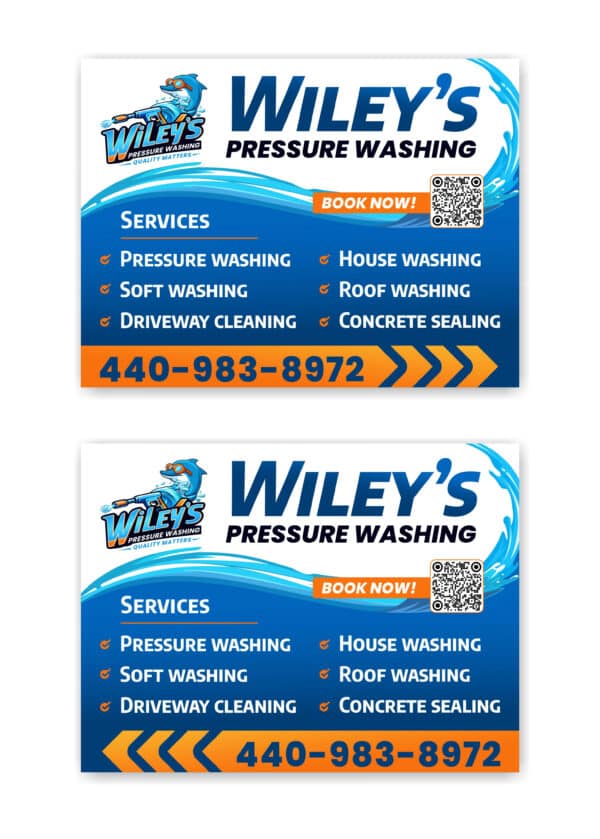 Rising from the flames of creativity, two professionally printed business card images for Wiley's Pressure Washing emerge, illustrating services such as pressure washing, soft washing, and house washing. Like a phoenix reborn with each wash, these cards include a QR code, contact number 440-983-8972, and a whimsical cartoon character riding waves of water.